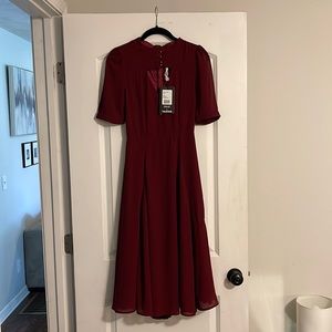 Beautiful wine colored dress, never worn! Still has tags!